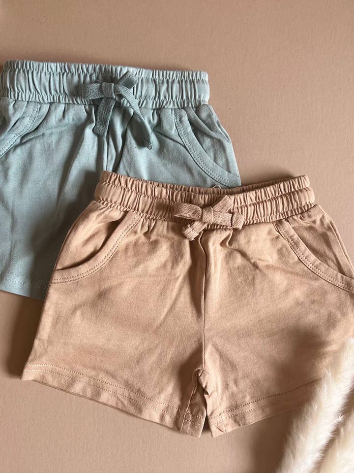 Kids spring/summer organic shorts with pockets relaxed style for wholesale by Little Organic Co