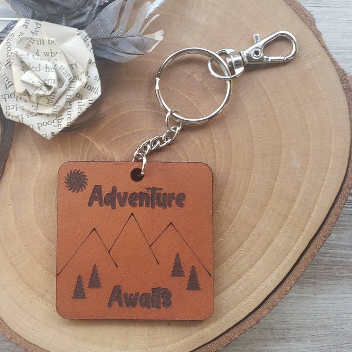 Adventure Awaits keychain for wholesale by Gone Rogue Boutique