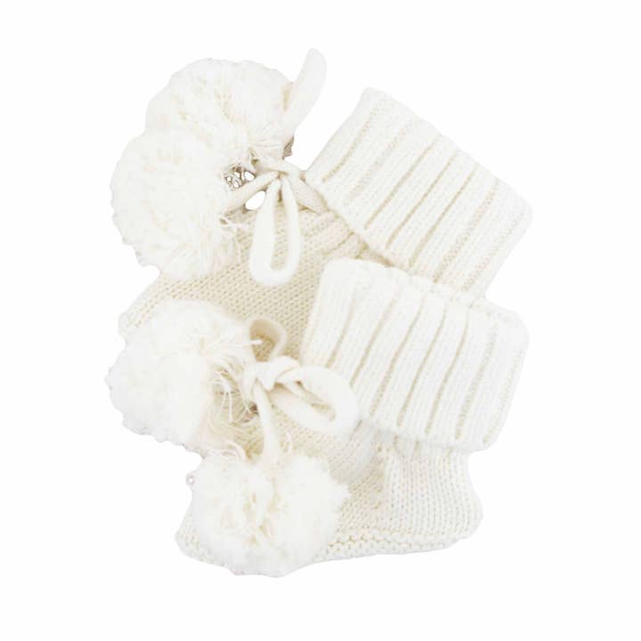 Knit Pom Pom Baby Booties | Ivory for wholesale by Caden Lane