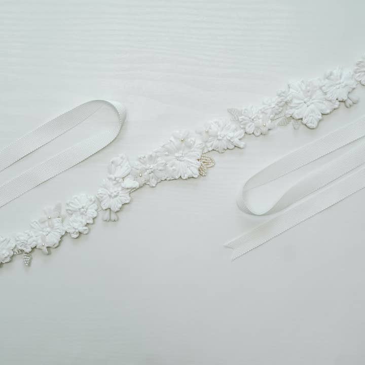 Molly White Raffia Floral Sash and other Purchase Wholesale petersham ribbon. Free Returns & Net 60 Terms on Faire trending on Faire.