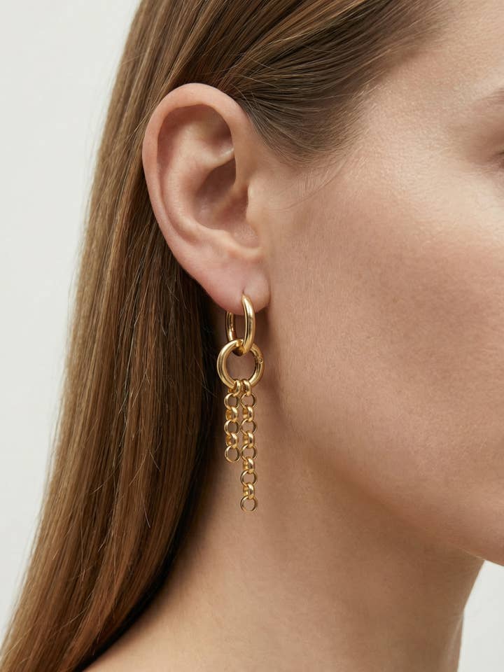 MOTION GOLD EARRING for wholesale by llayers