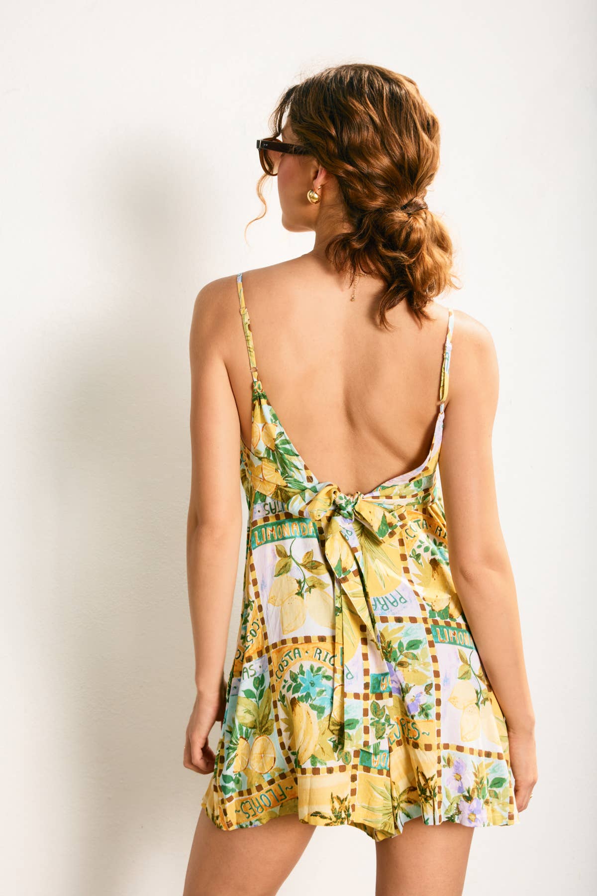 TROPICAL SUN Isla Palma Tie Back Detail Romper for wholesale on Faire2