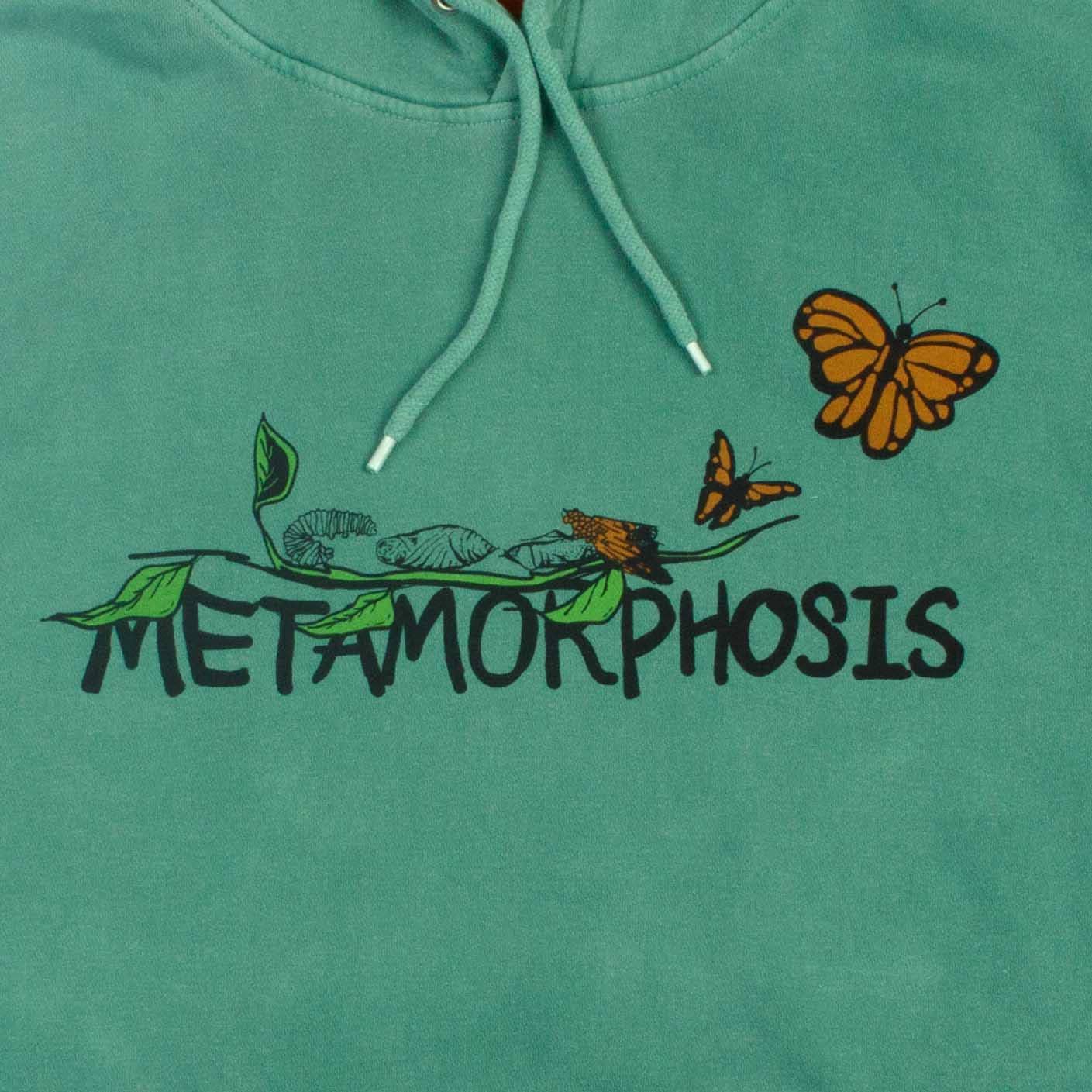 Vintage Green Metamorphosis Relaxed Fit Hoodie Sweatshirt for wholesale on Faire1