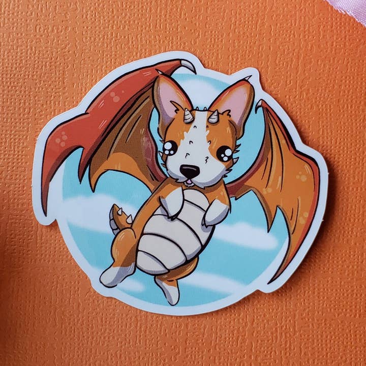 Autocollant Drogi (dragon + corgi) pour la vente par Meg's Mashables