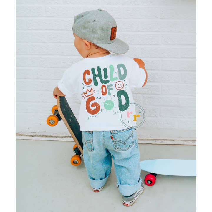Child of God Graphic T-shirt for wholesale by Rebellious Rose LLC