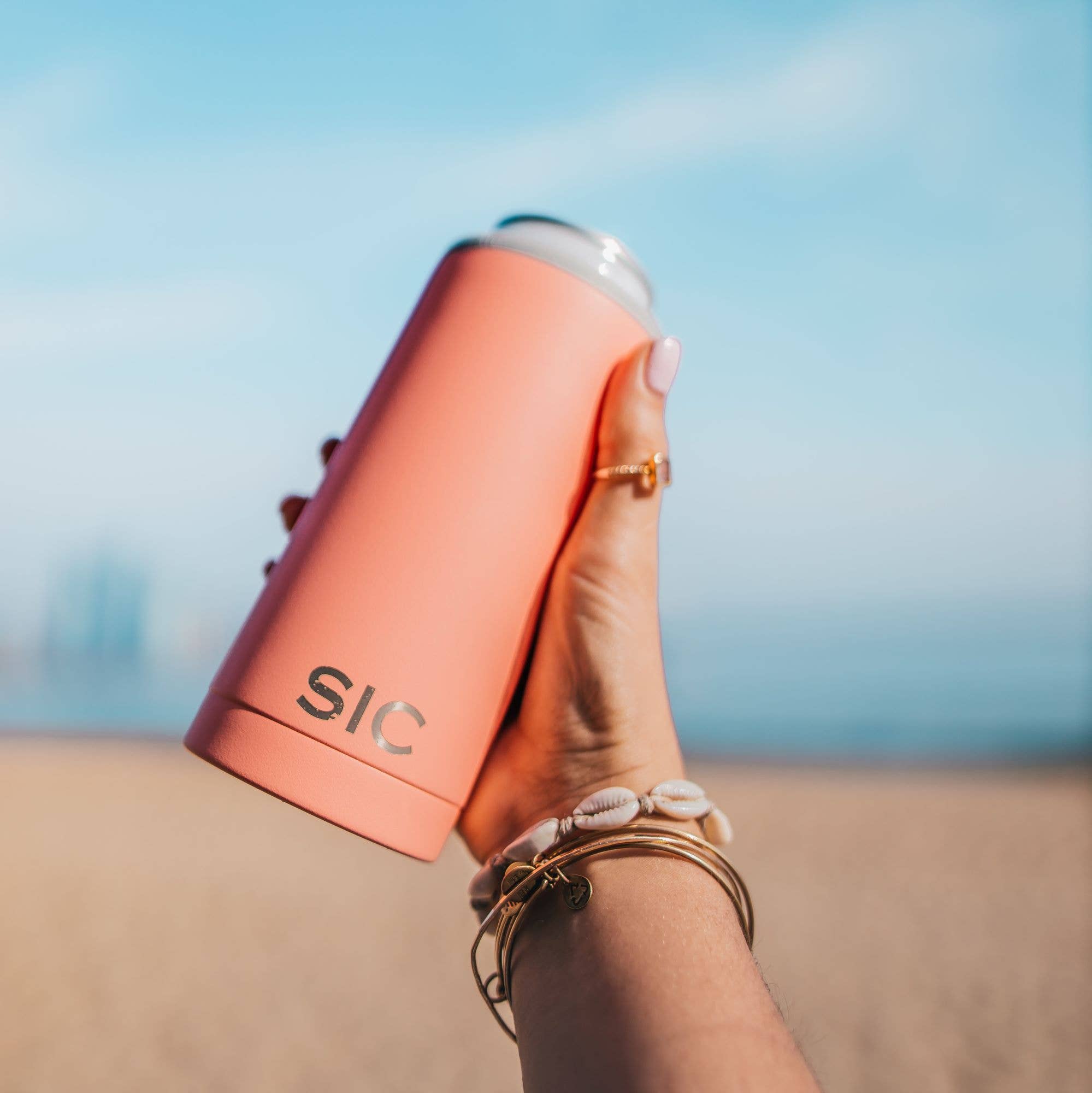 SIC Cups - Wholesale Drink Huggers & Koozies - SIC Slim Can Cooler | Matte Coral1