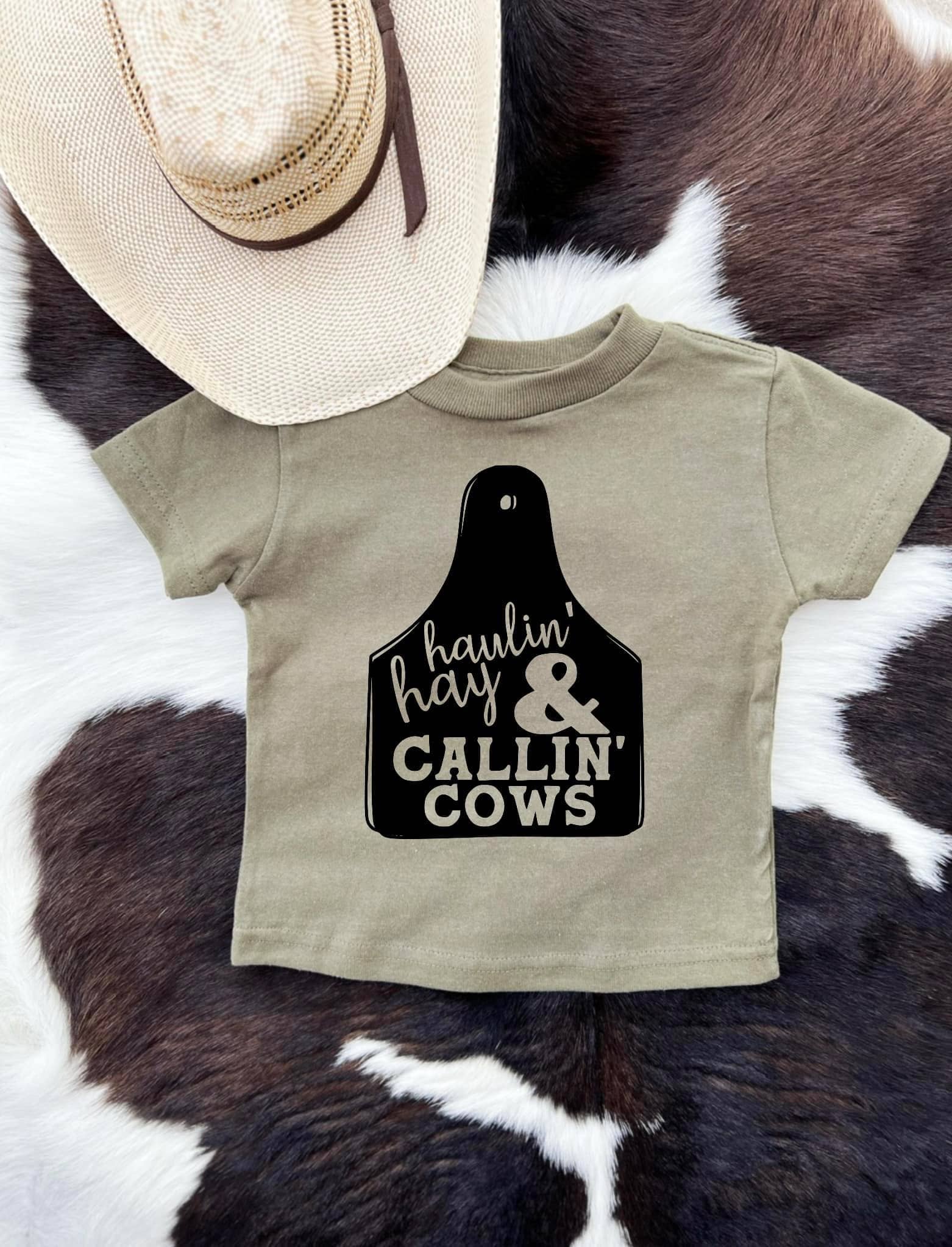 Olive Haulin hay & callin cows (cattle tag) for wholesale on Faire