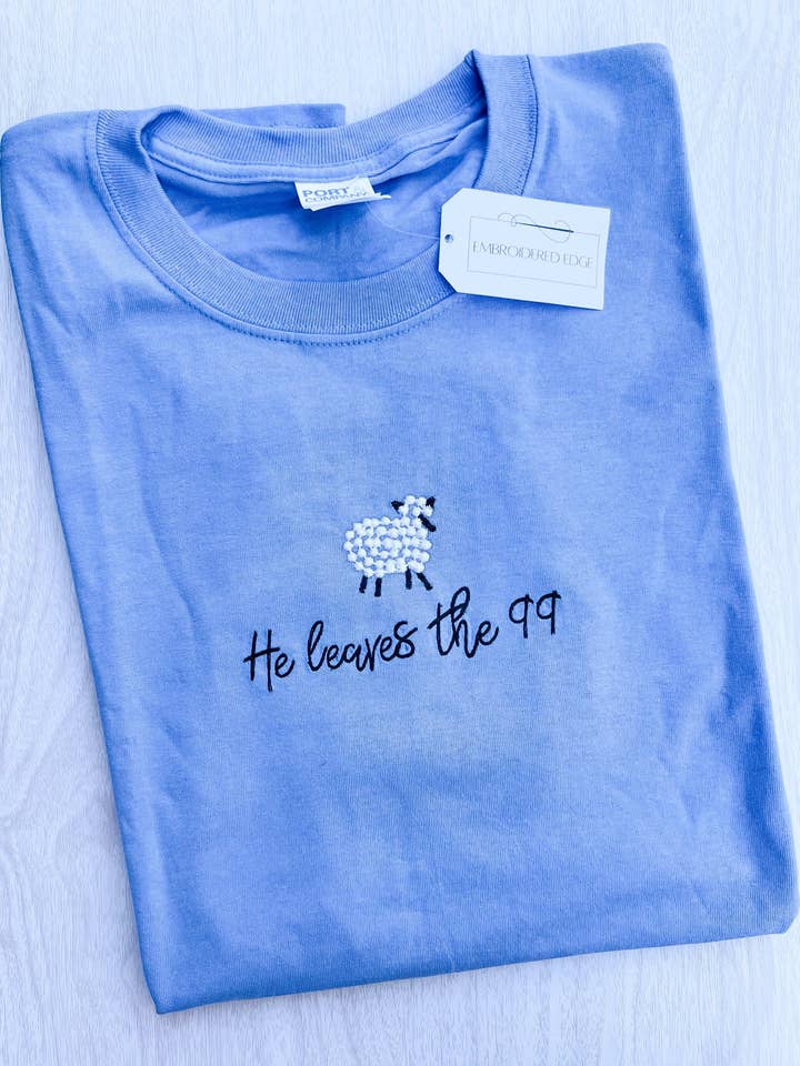 He Leaves the 99 Shirt for wholesale by Embroidered Edge