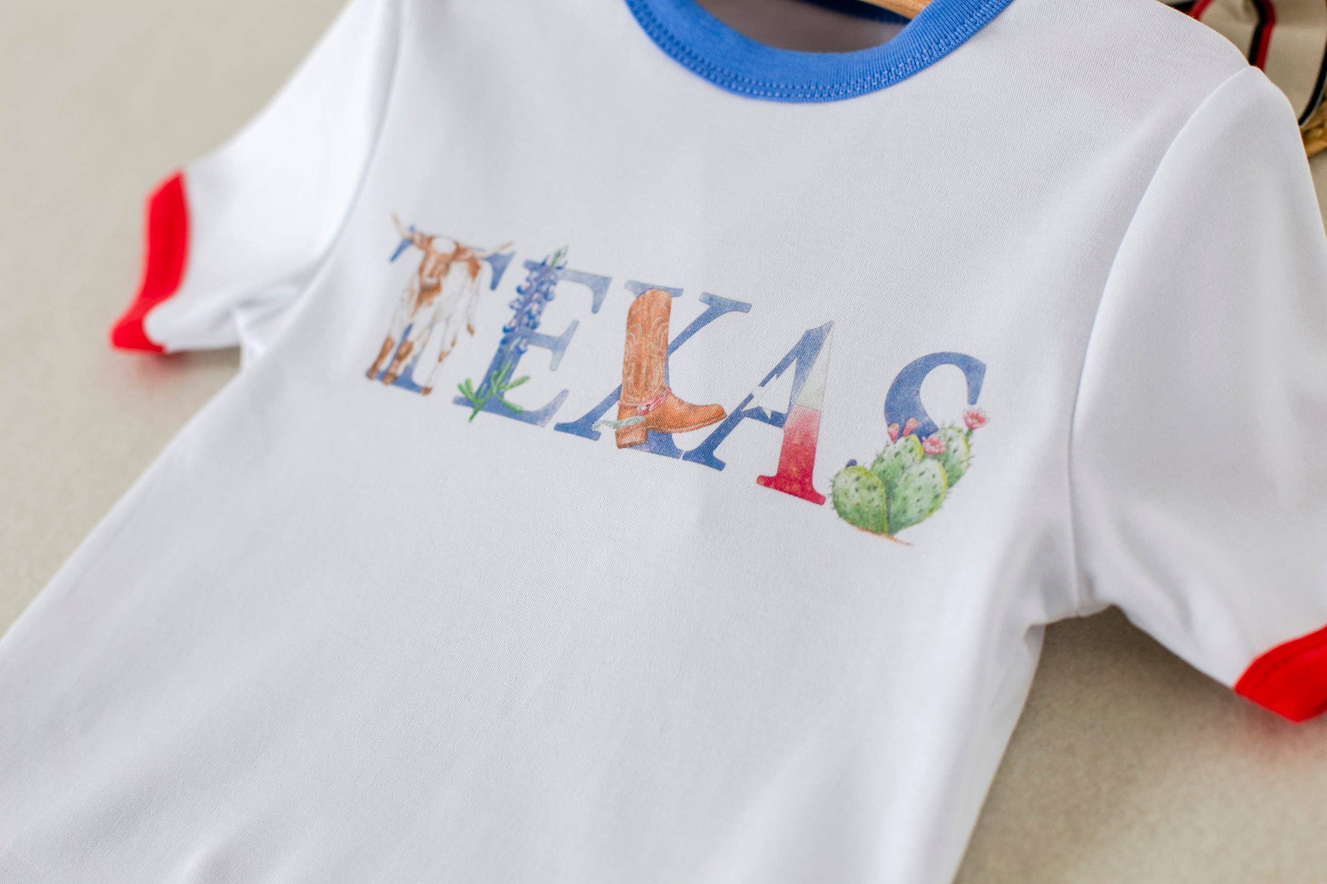 Nola Tawk - Vendita all'ingrosso Maglietta serigrafata - Bambini - T-shirt Little Texan in cotone biologico1