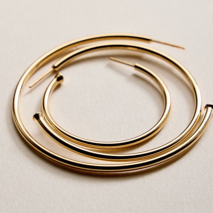 Gold Filled Oversized Hoop Earrings and other Purchase wholesale 35 mm. Free returns & net 60 terms on Faire trending on Faire.