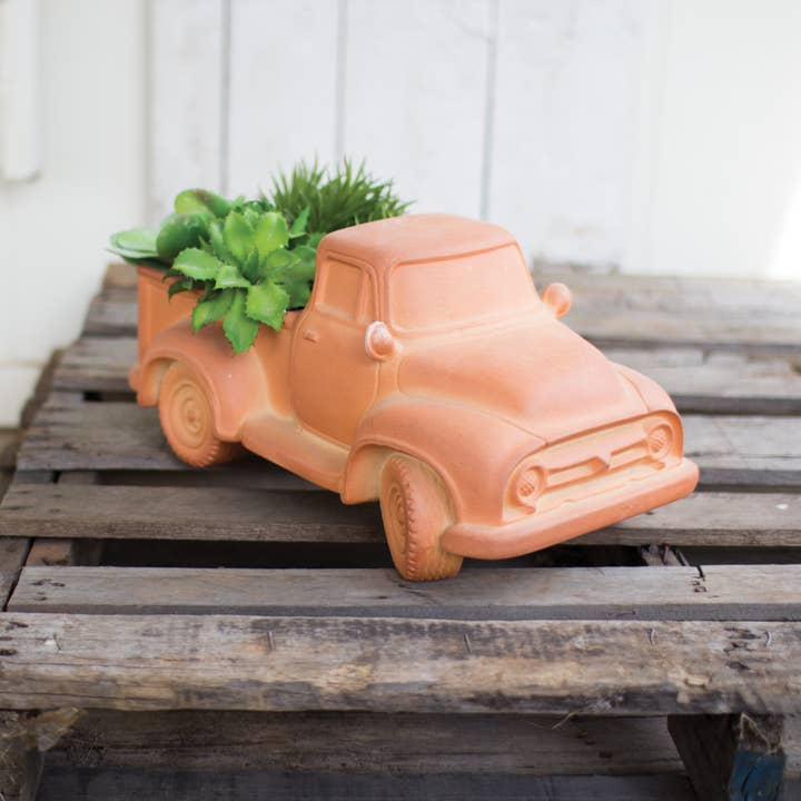 Orange CLAY TRUCK PLANTER for wholesale on Faire1
