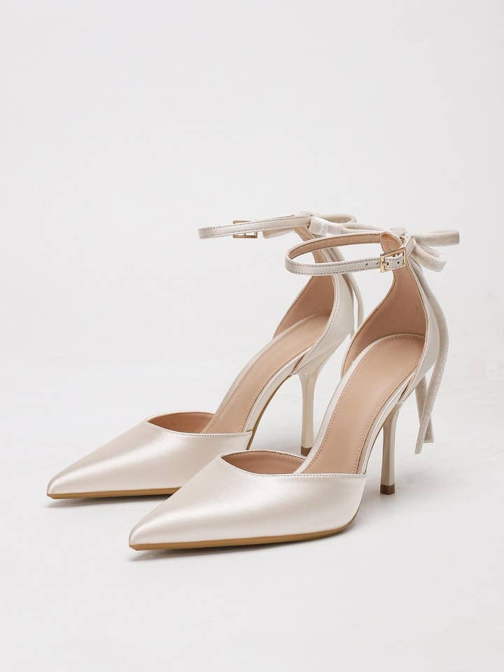 Sandales à talons hauts découpées à bout pointu avec nœud en velours pour la vente par JanL Ladies Shop