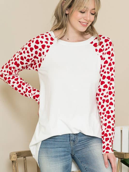 TOP A TUNICA CON MANICHE STAMPATE A CUORE A CONTRASTO per la vendita all'ingrosso da parte di Pink Irene Wholesale