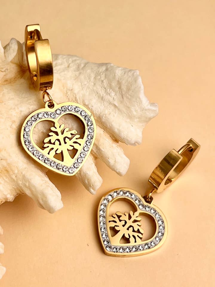 Boucle d'oreille pendante cœur et arbre de vie en acier pour la vente par COSMOS