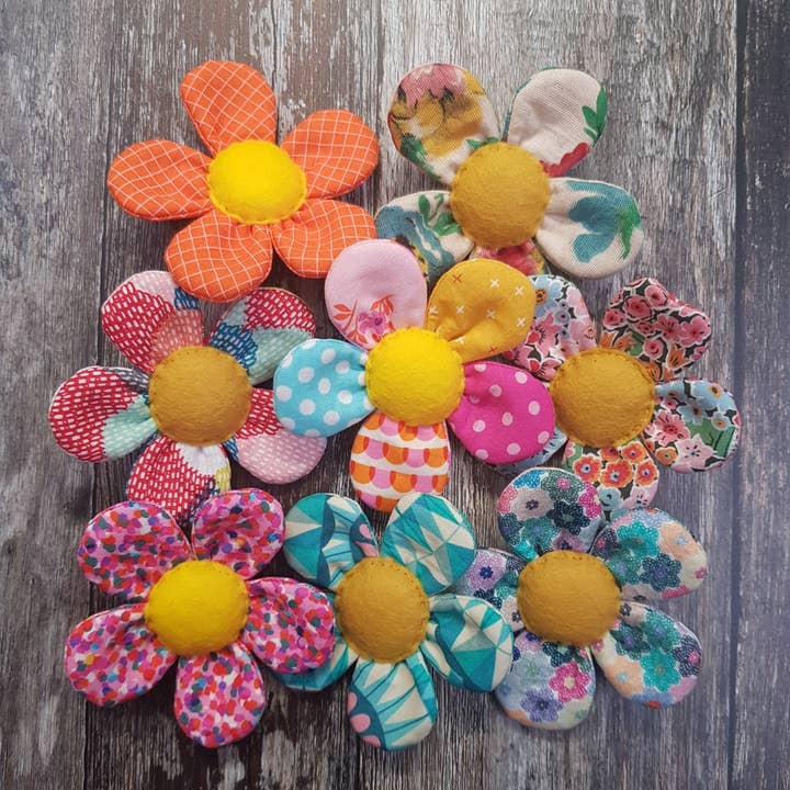 Handmade Fabric Flower Brooch (case of 16) and other Purchase Wholesale fabric flowers. Free Returns & Net 60 Terms on Faire trending on Faire.
