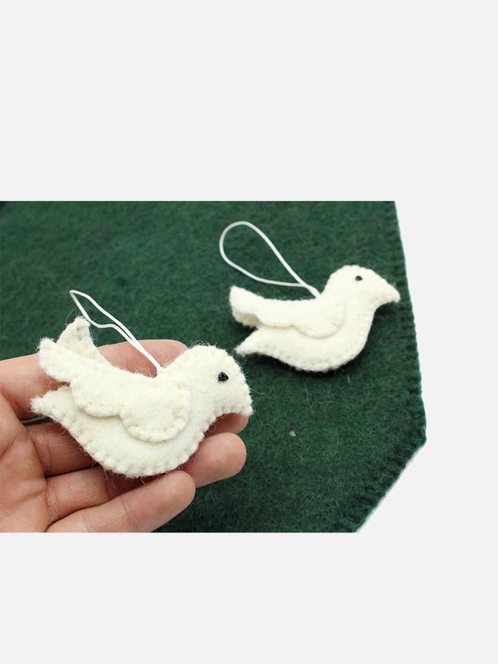 Handmade Felted White Easter Bird | Set Of 10 for wholesale by Woollyfelt