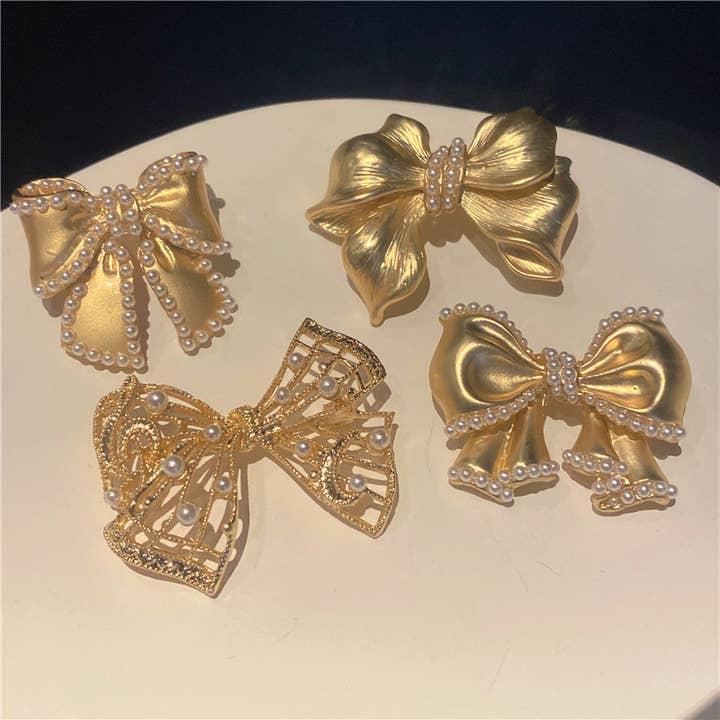 Tourtiwi - Wholesale Brooch - Gold-tone pearl bow brooch