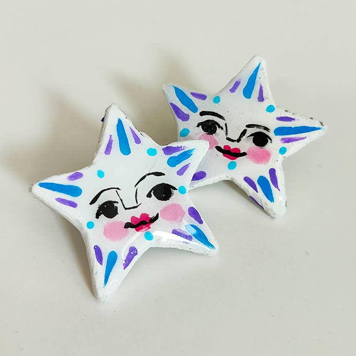 Happy star earrings for wholesale by Chunchitos