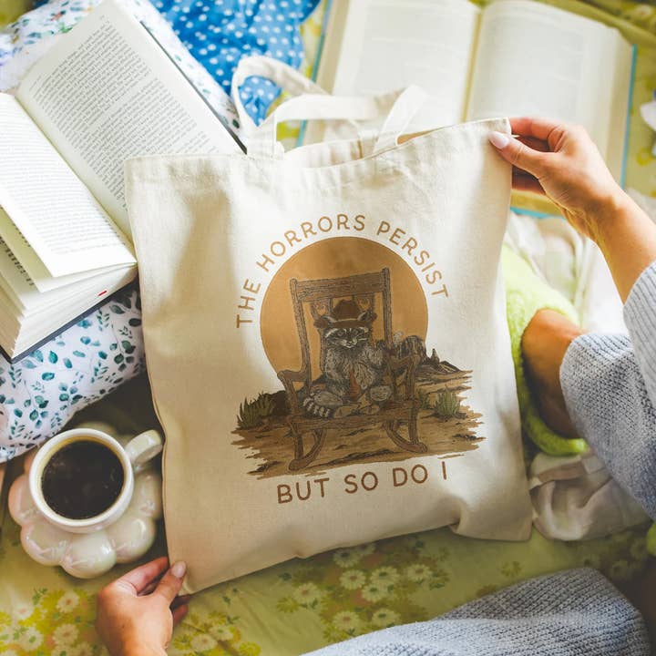 The Horrors Persist But So Do I Raccoon Cowboy Tote for wholesale by Cluster Funk Studio