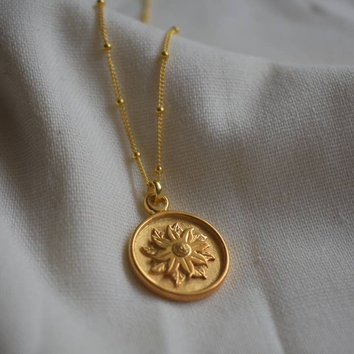 Poinsettia-Halskette mit Blumenmotiv (Dezember) für den Großhandel von Francesca Dot Jewellery