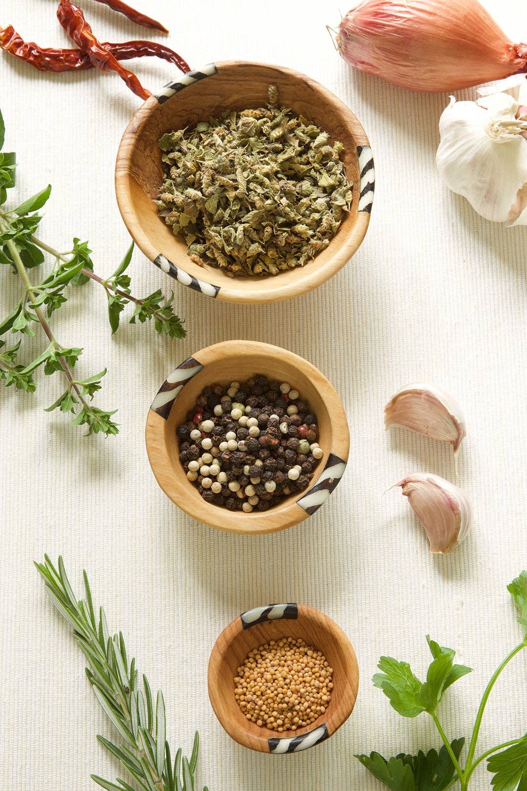Swahili | AFRICAN MODERN - Wholesale Decorative Plate/Dish/Bowl - Set of Three Small Wild Olive Wood and Bone Bowls1