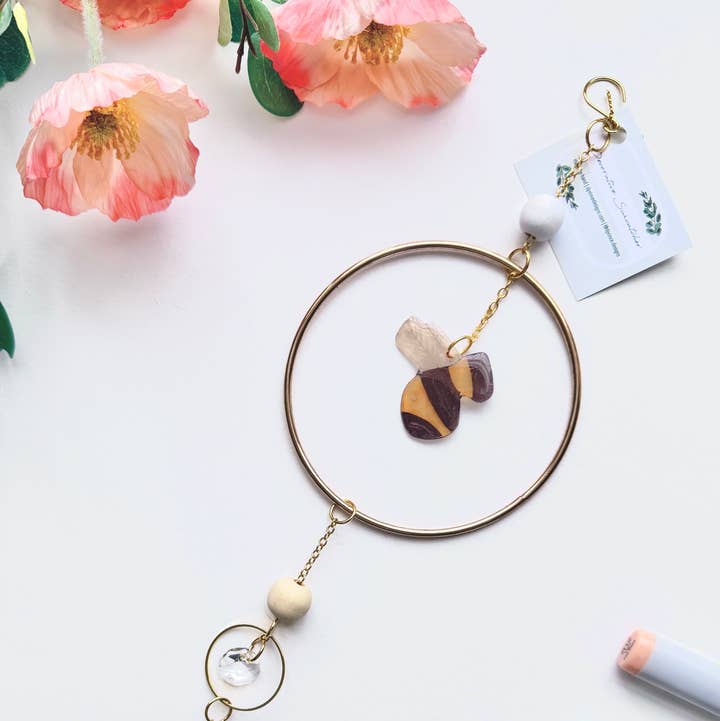 Handmade + Hand-Illustrated Bumblebee Suncatcher with Wood Beads for wholesale by D. Prince Designs