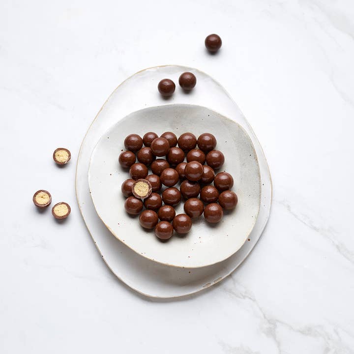 The Chocolate Society - Wholesale Chocolate-covered sweets - Milk Chocolate Malt Balls1