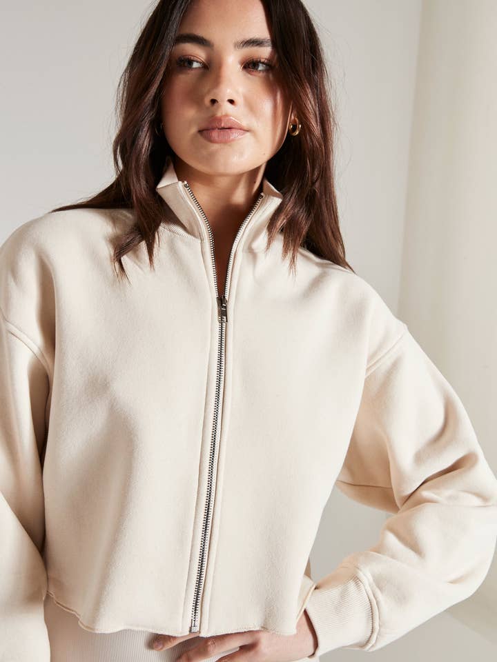 Shell Lily Full Zip Sweater (Shell) for wholesale on Faire
