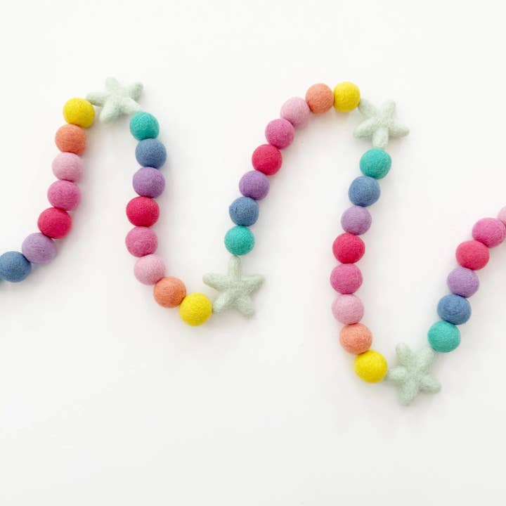 Star Rainbow Felt Ball Garland for wholesale by Glitter Party Co