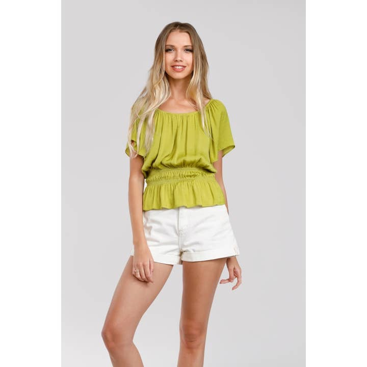 Raglan Short Sleeve Peplum Smocked Blouse for wholesale by Naked Zebra Rack