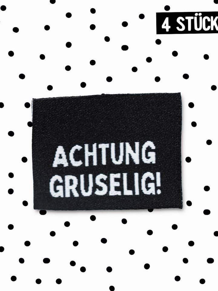 Klapp-Weblabel * Attention creepy! * - 3 x 2.3 cm - pack of 4 for wholesale by Paul und Clara
