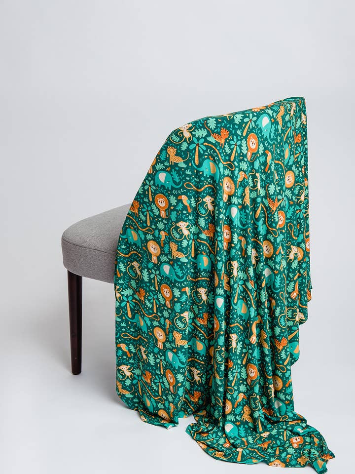 Grøn Jungle Swaddle for engroshandel hos Pax & Lucy