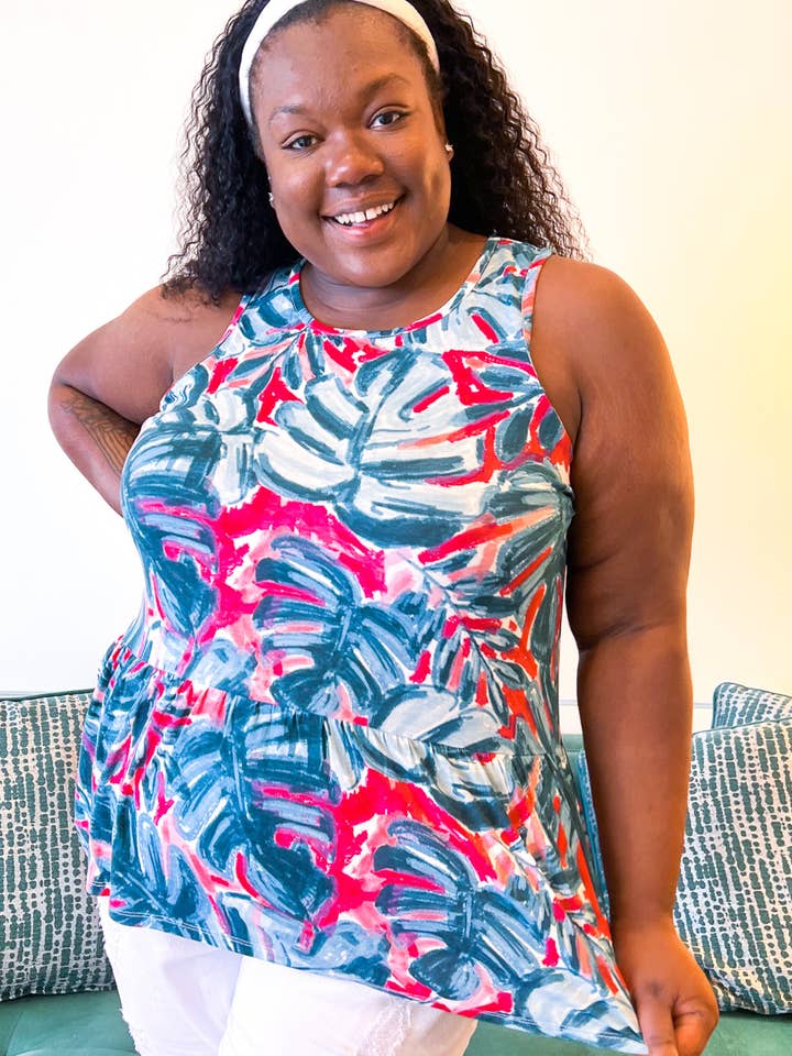 PLUS SIZE Micah Large Leaf Print Hi-Lo Slvless Peplum Tunic for wholesale by Nikki and Alex