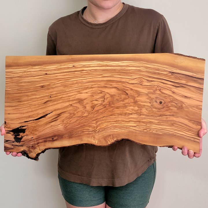 Extra Large 24" Live Edge Olive Wood Cheese Board for wholesale by Karmic Creations