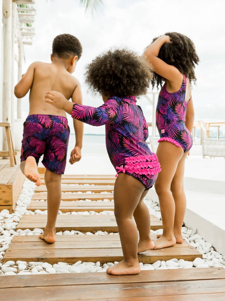 Black Boys Marine Glow Swim Trunks for wholesale on Faire
