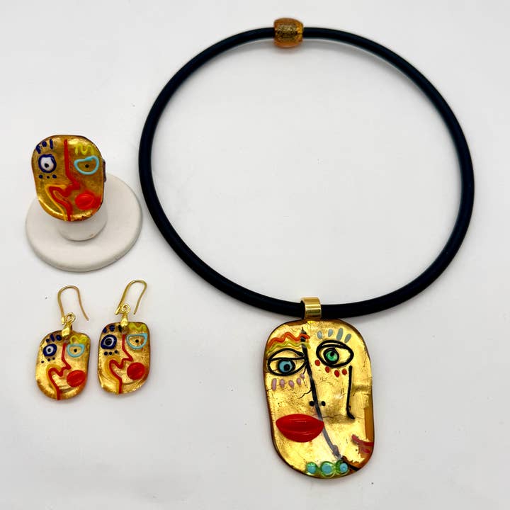 Picasso Ansigt Murano Glas Smykkekollektion for engroshandel hos Alice Sturzinger LLC