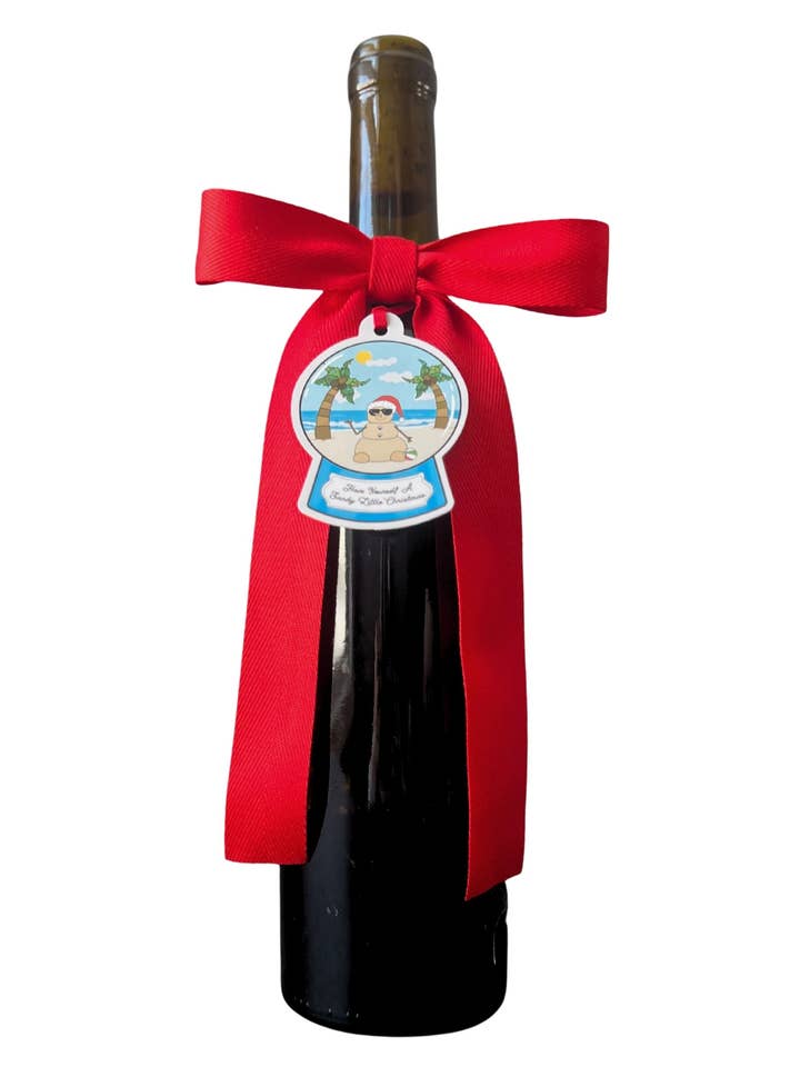 Bouteille Arc + Étiquette Cadeau™ - Boule à Neige Rouge Sandy Joyeux Noël pour la vente par Wrapido!