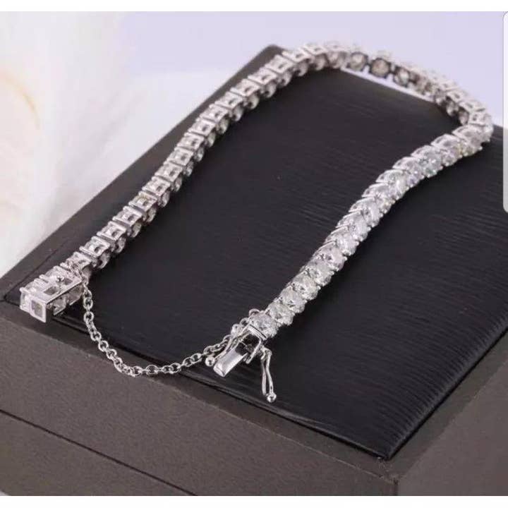 Round Zirconite Cubic Zirconia CZ Tennis Bracelet 698Bcast for wholesale by Diamond Veneer Travel Jewelry