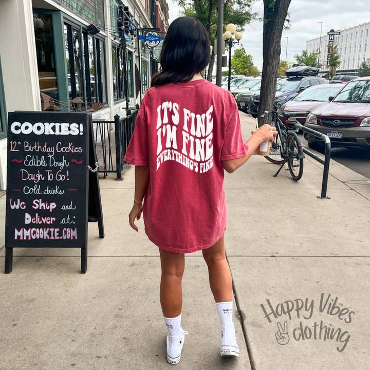 Funny tshirt It’s Fine, I’m Fine, Everything Is Fine T Shirt for wholesale by Happy Vibes Clothing