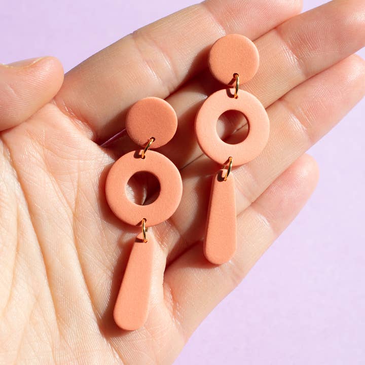 The "Packs a Punctuation" Earrings in Tangerine for wholesale by CleverlyCo.