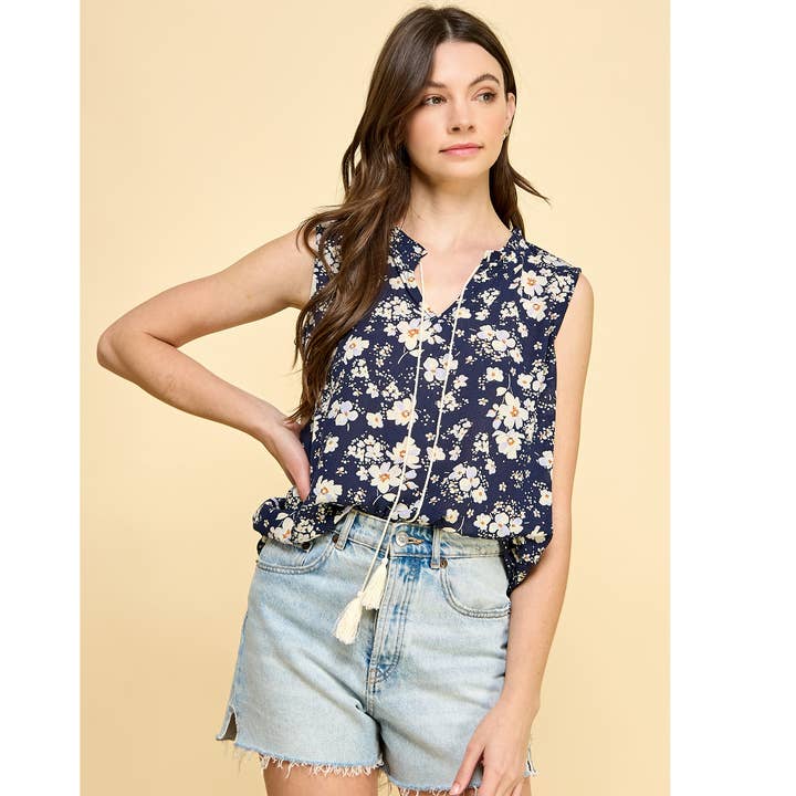 SLEVEELESS BABYDOLL TUNIC TOP WITH TASSEL for wholesale by Winslow Collection