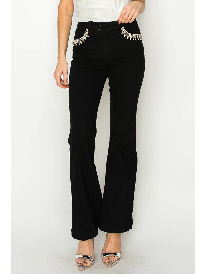 NERO JEANS A ZAMPA NERI CON DECORAZIONI E VITA ALTA INCROCIATA in vendita all'ingrosso su Faire