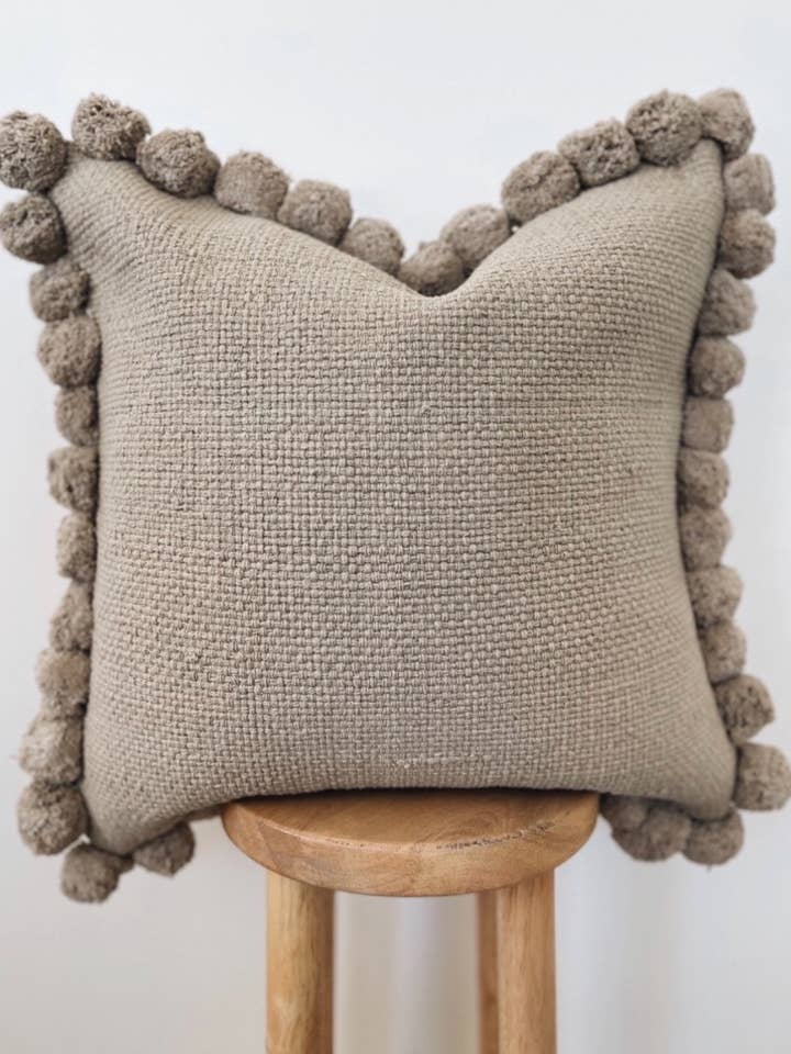 Woven Pom Pillow for wholesale by Collective Dwelling