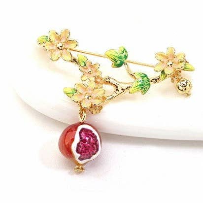 Handgefertigte, emaillierte Modebrosche mit Granatapfelblüte für den Großhandel von Exsito