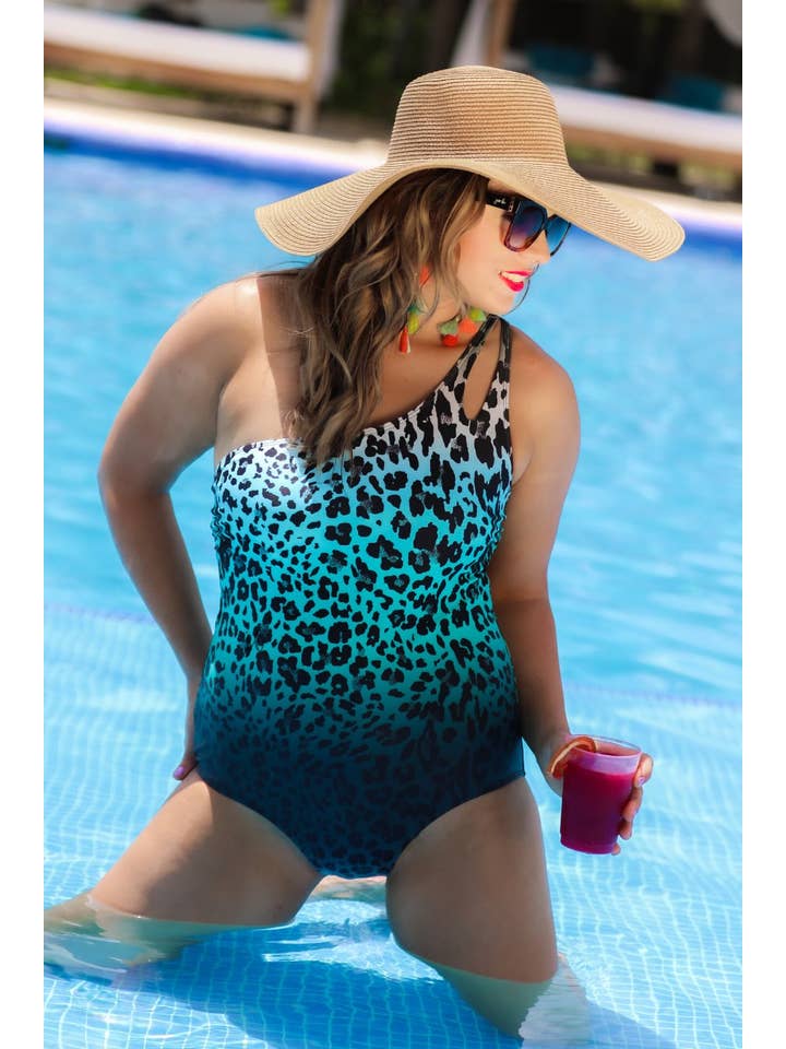 Tahiti Travels Turquoise Swimsuit for wholesale on Faire21
