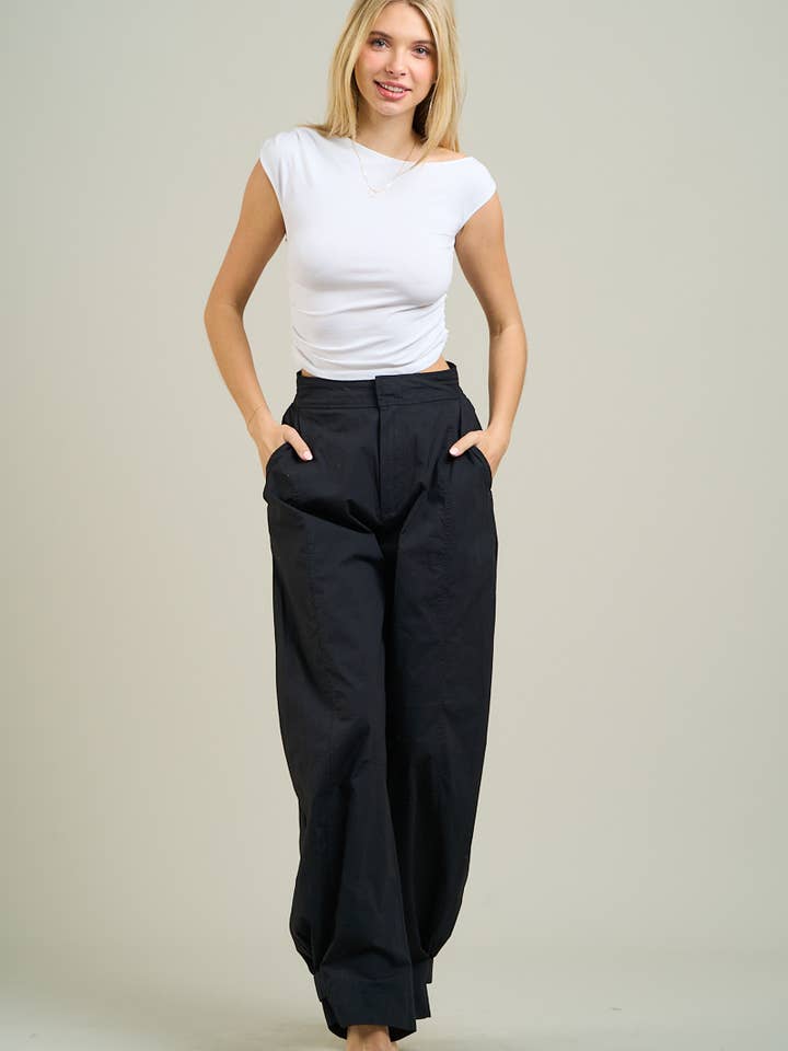 54457 - TOP ASIMMETRICO CON ARRICCIATURA LATERALE NK per la vendita all'ingrosso da parte di ANWND