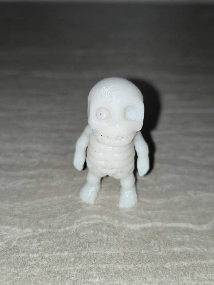 Scheletro stampato in 3D | Statuetta articolata | Flexi Animal per la vendita all'ingrosso da parte di Cosmic 3D Creations