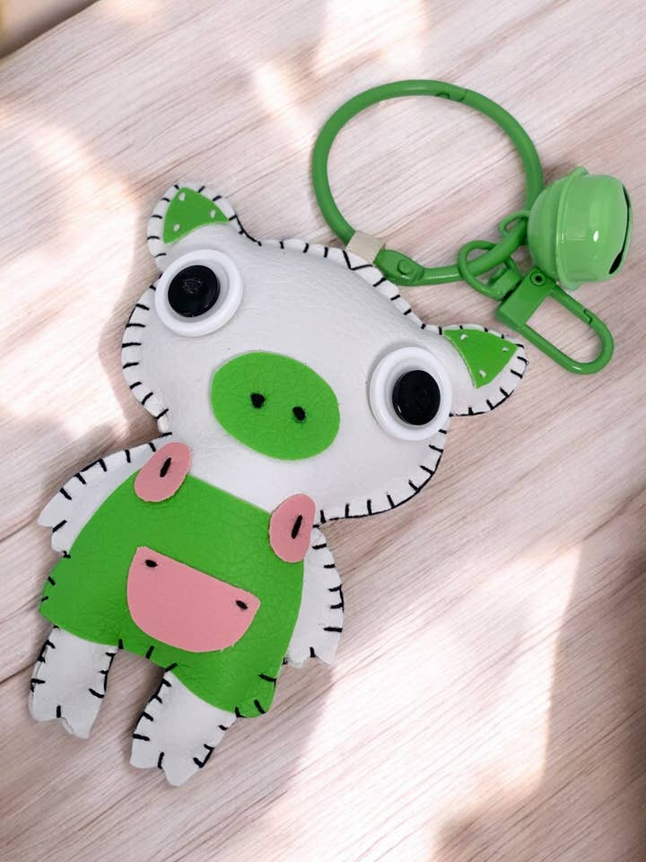 Portachiavi in peluche con campanellino JSG38 per la vendita all'ingrosso da parte di BYREN | ÉLINE L'ATELIER