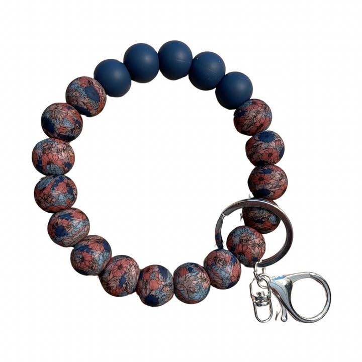 Moody Blue Blomstret Håndledsnøglekæde for engroshandel hos Shop Simply Fidgets