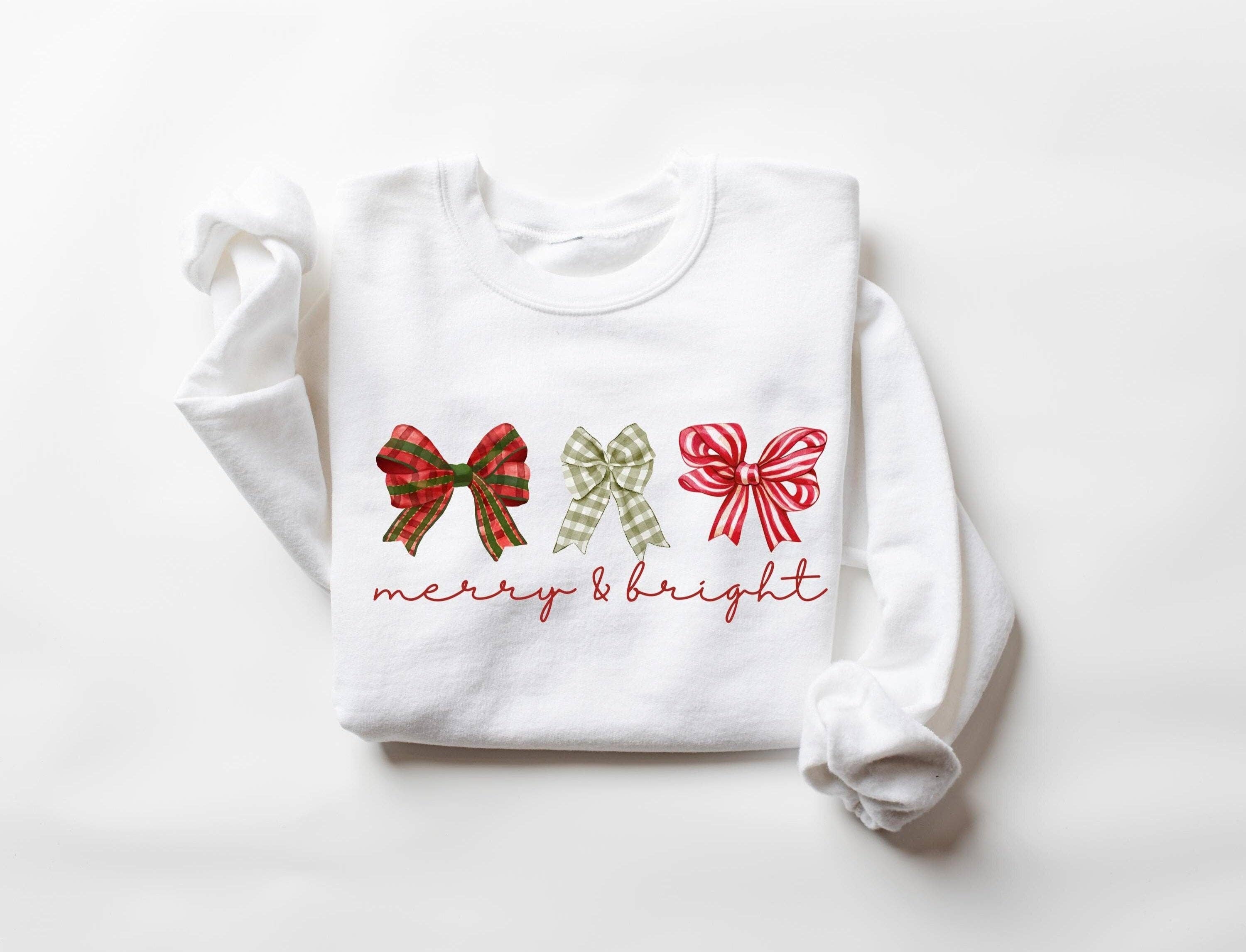 White Merry and Bright Three Bows Sweatshirt for wholesale on Faire1
